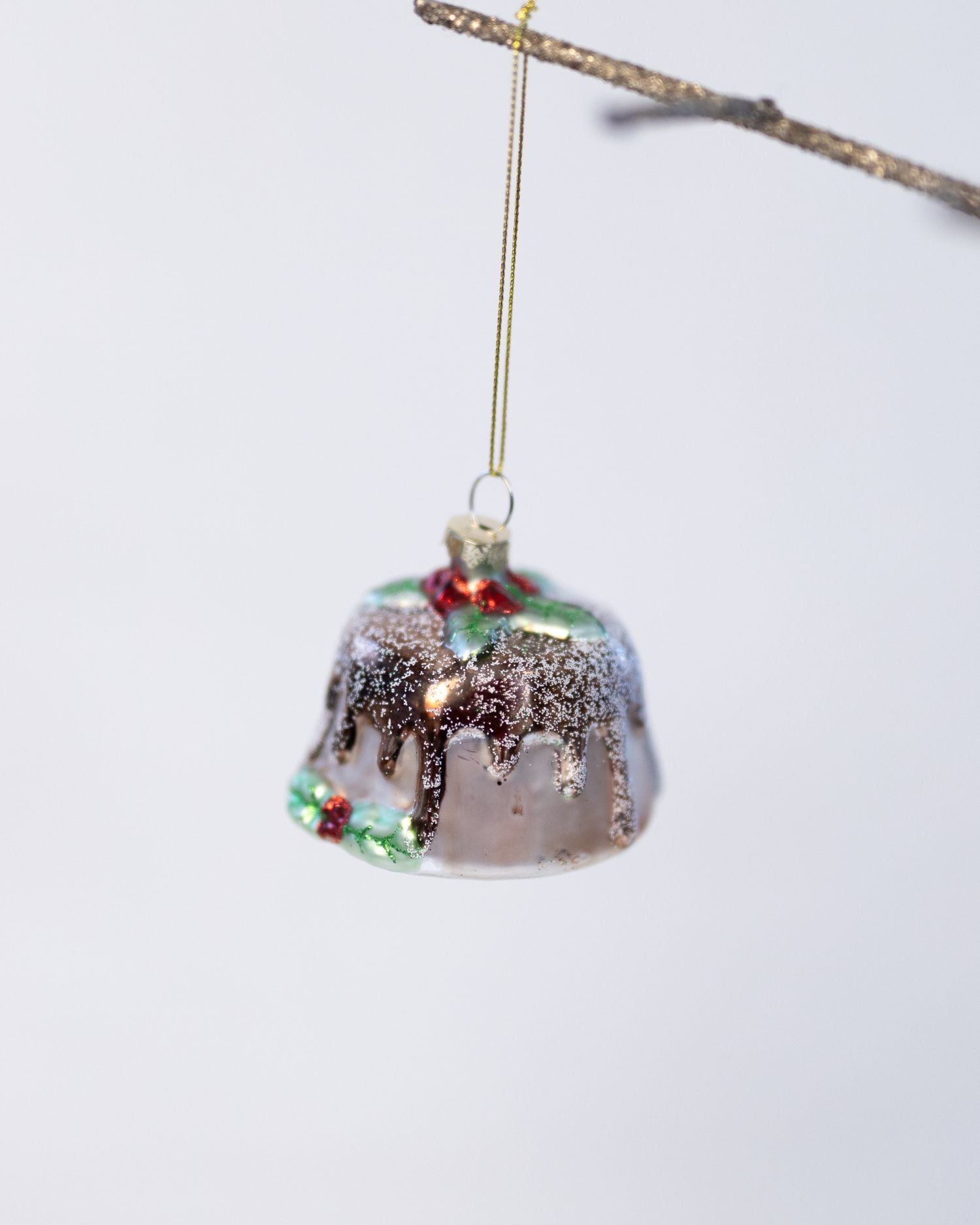 Decorative Christmas pudding ornament on a white background